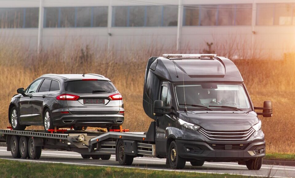 [freepicdownloader.com]-emergency-tow-service-recovers-highway-car-large